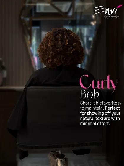 The Curly Bob. This short, chic, and easy-to-maintain style is perfect for showing off your natural texture with minimal effort. We cut it to enhance your curl pattern beautifully.