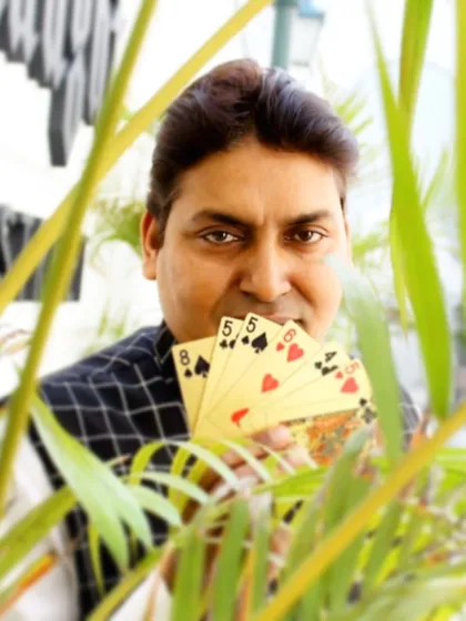Ready with a deck of cards for some close-up magic. This style is perfect for getting people to interact and share a moment of wonder.