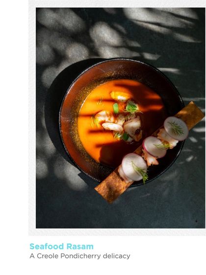 Seafood Rasam, a Creole Pondicherry delicacy featured during a pop-up event. This dish highlights our commitment to exploring the rich diversity of regional Indian flavors for our special menus.