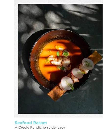 Seafood Rasam, a Creole Pondicherry delicacy featured during a pop-up event. This dish highlights our commitment to exploring the rich diversity of regional Indian flavors for our special menus.