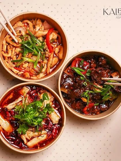 A trio of our classic wok-tossed dishes. This spread includes my Celery Ginger Chicken, Sliced Lamb in Black Pepper Sauce, and Steamed Sole Fish in Chili Oil.