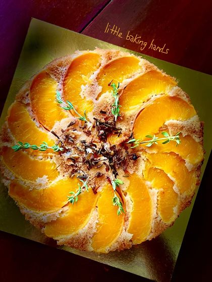 An upside-down peach and thyme cake. The herbs add a lovely savoury note that complements the sweetness of the peaches.