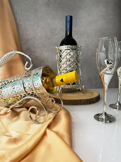 Winter parties call for fine wines and flawless decor. My collection of wine holders and heart-themed glasses helps you set the perfect tone for an elegant celebration.