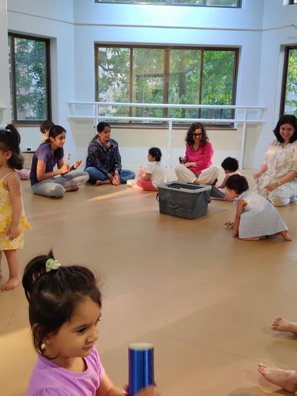 The joy of a family music class is in these simple moments. Children exploring, parents connecting, and everyone sharing in a relaxed, happy, and musical environment.