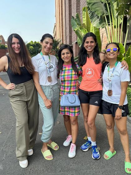 A duplicate of image 102. More post-race celebrations with my running girls in Delhi.