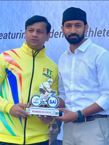 Receiving a memento at a Fit India 'Sundays on Cycle' event. I actively participate in and support all kinds of fitness initiatives.