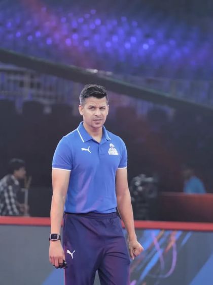 A confident look on the sidelines. Ready for whatever the game throws at us.