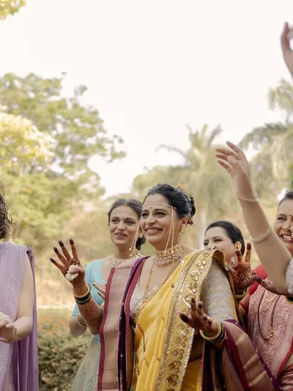 The bride's own 'baraat', dancing her way to the mandap with her friends and sisters. This is a powerful and joyful expression of female solidarity and celebration.