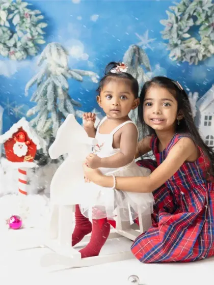 Playing in the "snow" during a Christmas mini session. I create a fun and interactive environment to bring out the most joyful expressions.