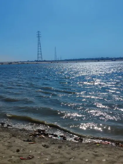 The shimmering waters of the holy river at the Kumbh Mela. Taking a dip here is an act of surrender and is believed to wash away lifetimes of karma.