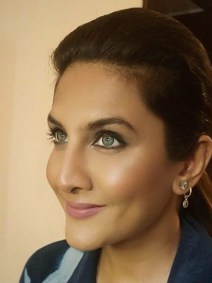 This shot showcases the radiant skin finish and the overall fresh and polished feel of the makeup, proving that at-home service means no compromise on quality.