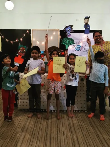 Look at these happy faces! After a super fun storytelling session, our little creators get to show off the amazing puppets and artwork they made. This is what pure joy and imagination look like.
