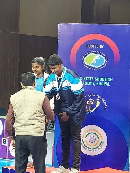 Jonathan receiving his silver medal on the podium at the 66th NSCC.