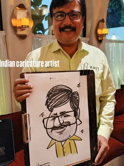 An employee from KPIT with his caricature at the one8 commune event. It's a great way for companies to show appreciation for their team.