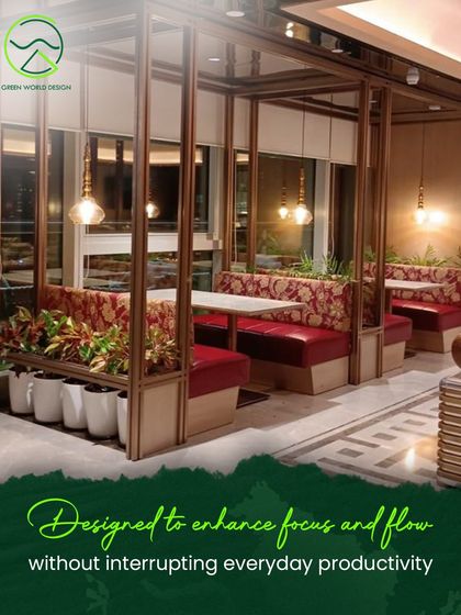 In the cafeteria at The Executive Centre, planters are integrated into the booth seating. This design enhances focus and flow without interrupting productivity, creating intimate dining nooks surrounded by greenery.