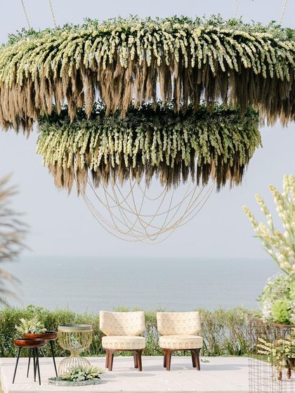 A massive, two-tier mandap we created for a beach wedding in Goa. Made of five layers of kamini leaves, gypsophila, tuberoses, and dry grass, it was a masterpiece of subtle, natural grandeur.