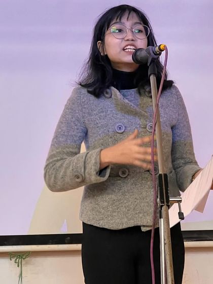 A student performer at a slam poetry event we judged at Gargi College. We are always impressed by the talent we witness at university events.