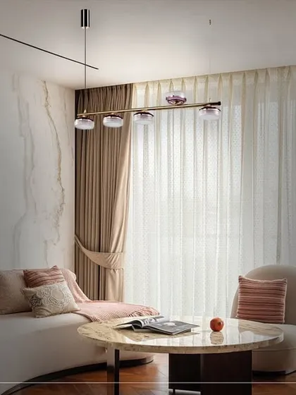 Here is the same living space, but with a different lighting choice: a minimalist linear fixture with smoked glass globes. This demonstrates how changing the central light can completely alter the room's mood to something more subtle and understated.