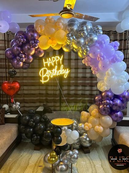 A multi-colored balloon ring decoration showing how different chrome and pastel balloons can be combined for a unique look.