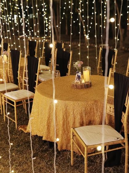 Another view of the guest seating, showing how the warm glow of the fairy lights creates a magical dining experience.