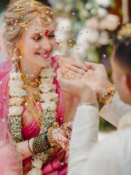 A joyful moment from a wedding ceremony, with the bride's stained hands at the center. My natural henna provides a safe and beautiful result for your most important day.
