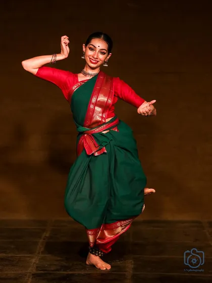 A joyful, energetic pose from a performance. I love moments like this that are full of life and movement.