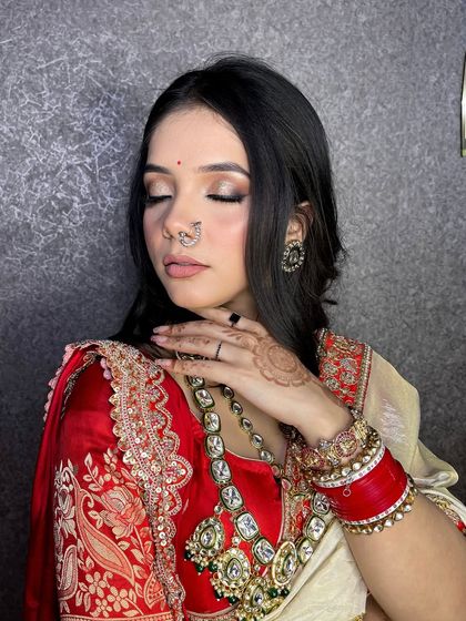 The eyes tell a story. This shot highlights the beautiful, soft-glam eye makeup.