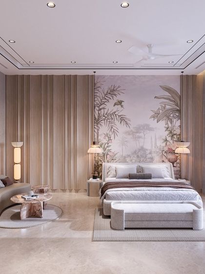 This wide view of a bedroom concept shows a large, serene wallpaper mural behind the bed, complemented by fluted wall panels and a curved sofa. The room feels spacious, light, and luxurious.
