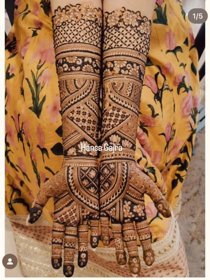 A stunning full-coverage design with bold, contrasting patterns. The geometric and traditional motifs are perfectly balanced, creating a powerful and symmetrical look.