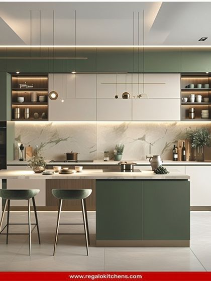A beautiful example of a two-tone island kitchen, combining earthy green and off-white cabinetry. The waterfall island includes a breakfast bar, making it a versatile space for meal prep and casual dining, all while overlooking a garden view.