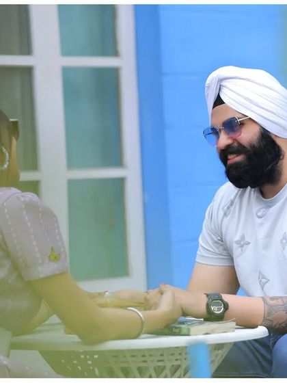 A sweet, intimate moment over a cup of coffee during a pre-wedding shoot. This casual setup feels very natural and tells a story of shared quiet moments.