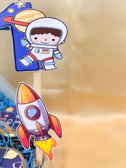 Every detail is themed, right down to the rocket ships and astronaut cutouts that decorate the treat jars inside.