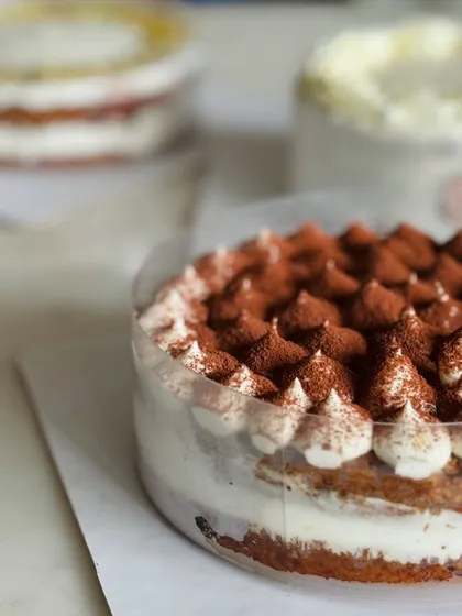 Savor the delicate flavors of my non-chocolate cakes, like this Tiramisu. All my cakes, including this one, are available in vegan, sugar-free, and gluten-free options.