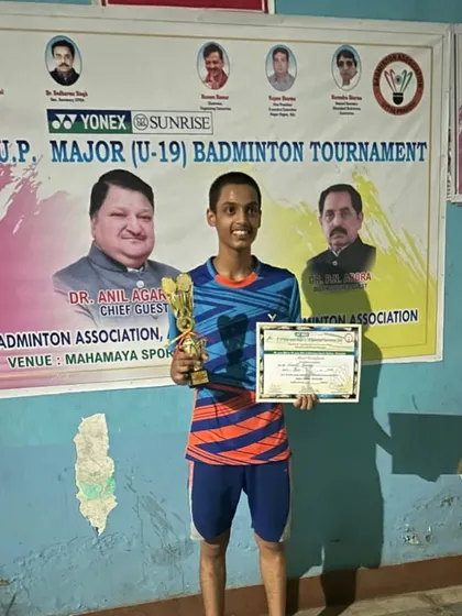 **U.P. Major U-19 Bronze Medalist.** Sanrekh Chaurasiya with his trophy after securing a bronze medal in the Boys' Doubles U-19 event.