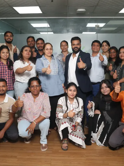 My team and I giving a thumbs-up. We are passionate about what we do, and our positive energy and teamwork are essential to creating a great experience for you on your wedding day.