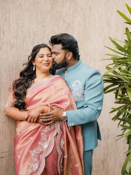 A sweet moment from an engagement ceremony. I created a soft, romantic makeup look with gentle waves in her hair that perfectly complemented her beautiful pink saree and the happy occasion.