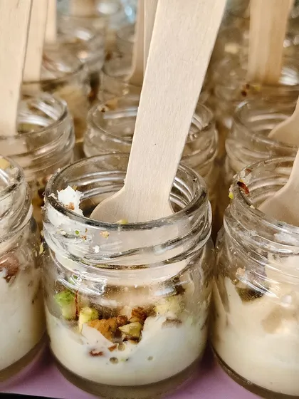 Little jars, big indulgence! These dessert jars are layered with creamy pudding and crunchy nuts, offering a delightful experience in every spoonful.