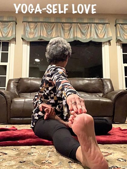 Practicing a seated twist at home. This is a great pose to do after a long day to unwind the spine.