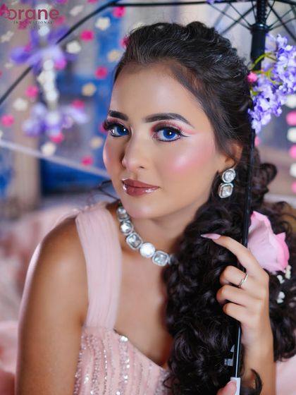 A stunning close-up that captures the bright, wide-eyed look of a Disney princess.