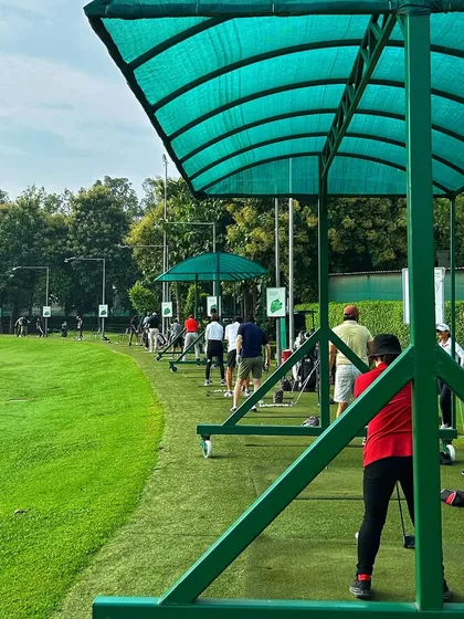 A look down the line of our covered bays, filled with golfers working on their game.