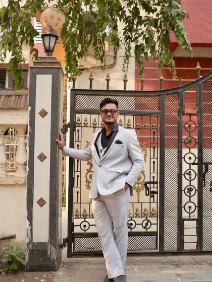 This three-piece grey suit is a complete rental solution for any formal event. The client looks confident and ready for his special occasion.