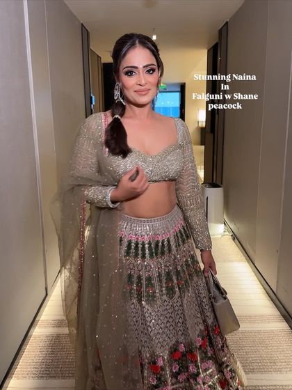 The final look for the groom's mami. She looks absolutely stunning in this pastel Falguni Shane Peacock lehenga, ready for the wedding festivities.