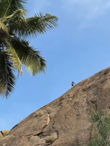 Raghava making the spicy 5.10b climb "Prema’s chapathi dough" look easy. This route is a local classic, known for its technical slab moves that test your footwork and balance.