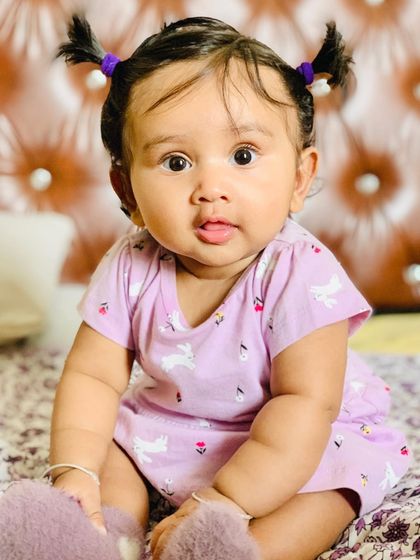 My doll in her cute purple outfit.