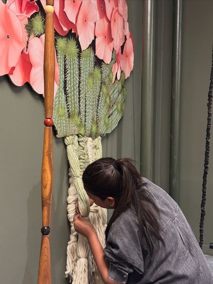 Bringing the sketch to life. Here, I'm working on the hand-woven macrame portion of the sculptural art piece, a slow and meditative part of the process.