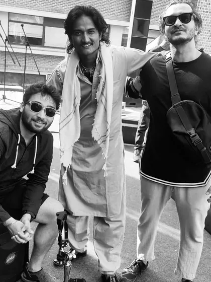 A black and white photo with my folk musician brothers during a soundcheck in Delhi.