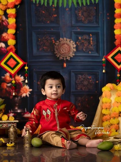 A full view of our elaborate Ugadi setup, featuring a richly decorated backdrop, brass lamps, and festive elements that create an authentic atmosphere.