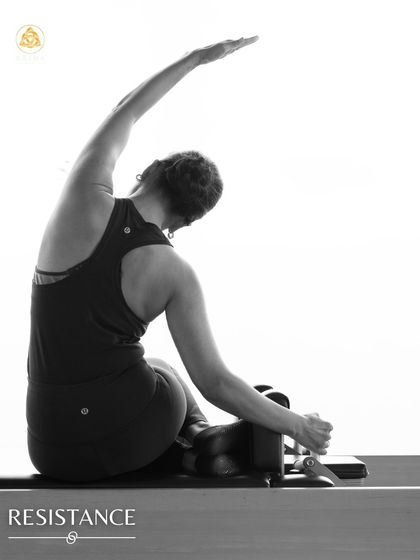 Working with resistance is a core component of Pilates. This side bend on the Reformer challenges the obliques while requiring control and graceful movement.