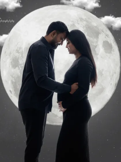 A romantic silhouette of a couple against a full moon backdrop, with added clouds for a dreamy effect.