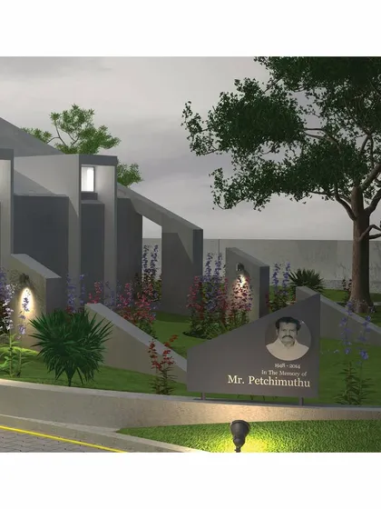 A 3D visualization of the memorial's entrance, marked by a commemorative plaque. The design uses layered geometric forms and carefully selected plantings to guide visitors and set a respectful, welcoming tone.